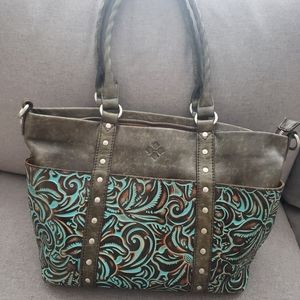 Patricia Nash bag and matching wallet.